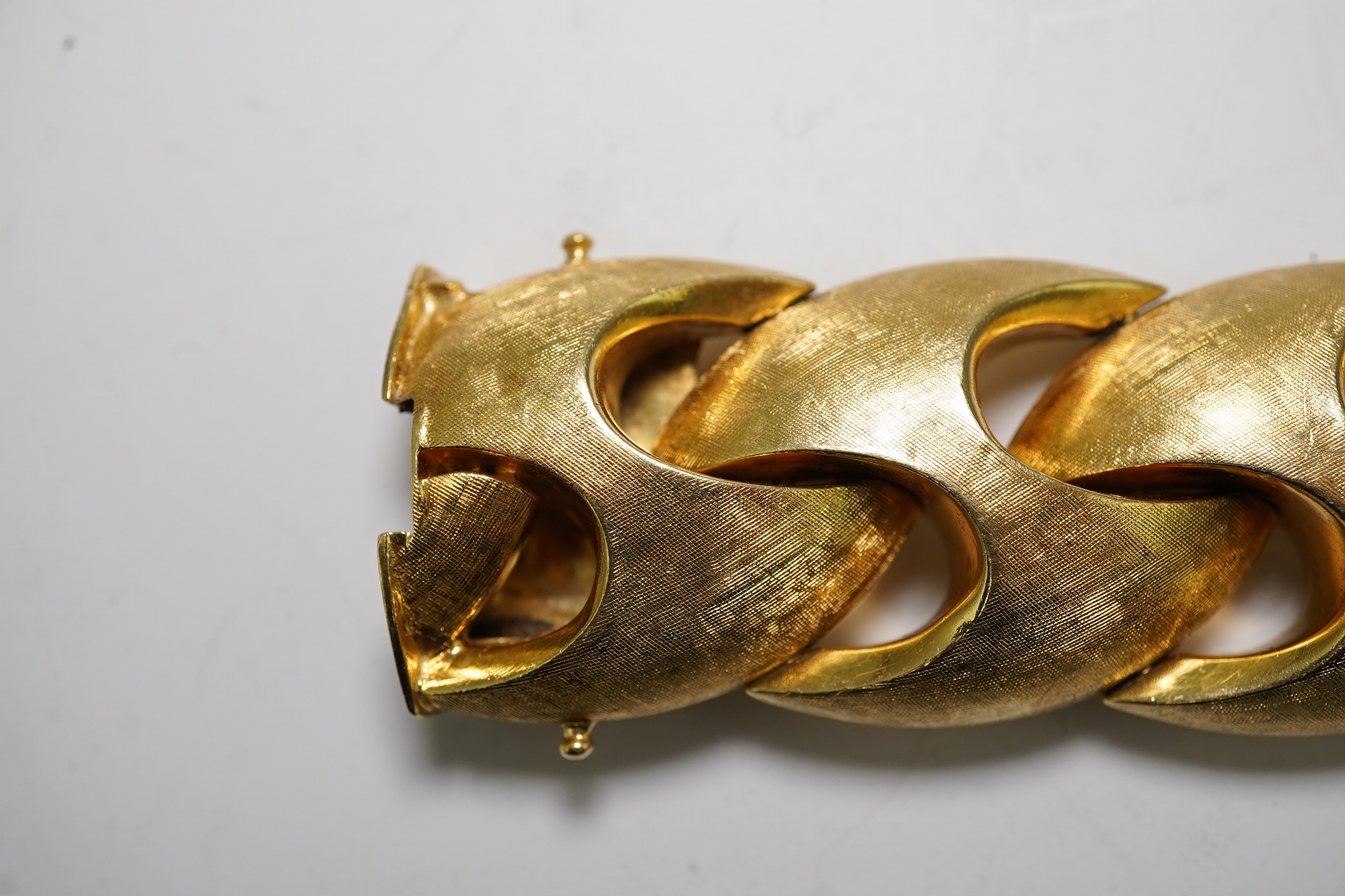 A stylish early 1970's brushed 18ct gold bracelet